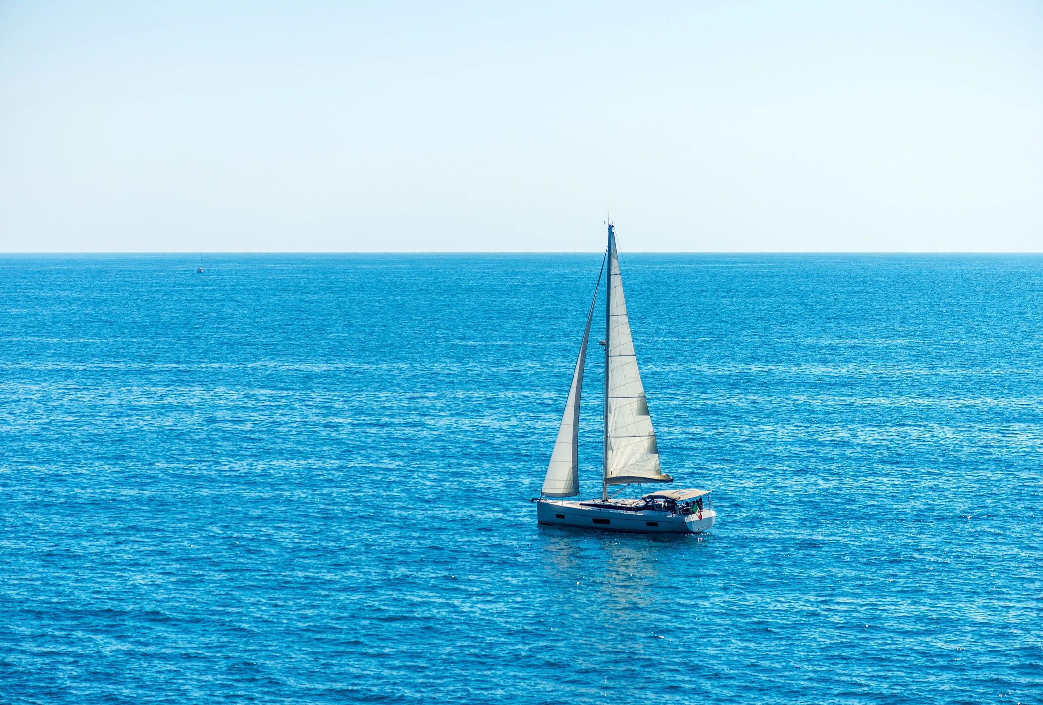 Sailboat under sail on open water