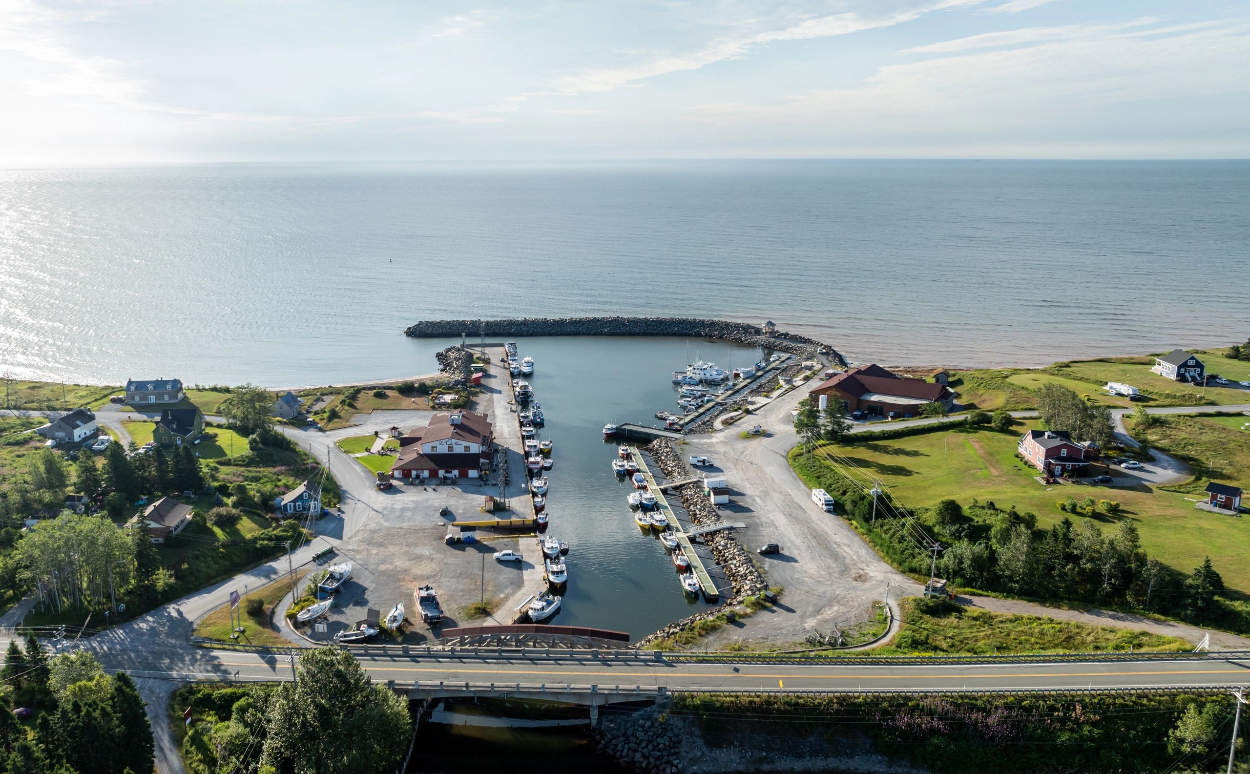 Aerial view of a coastal inlet and docks