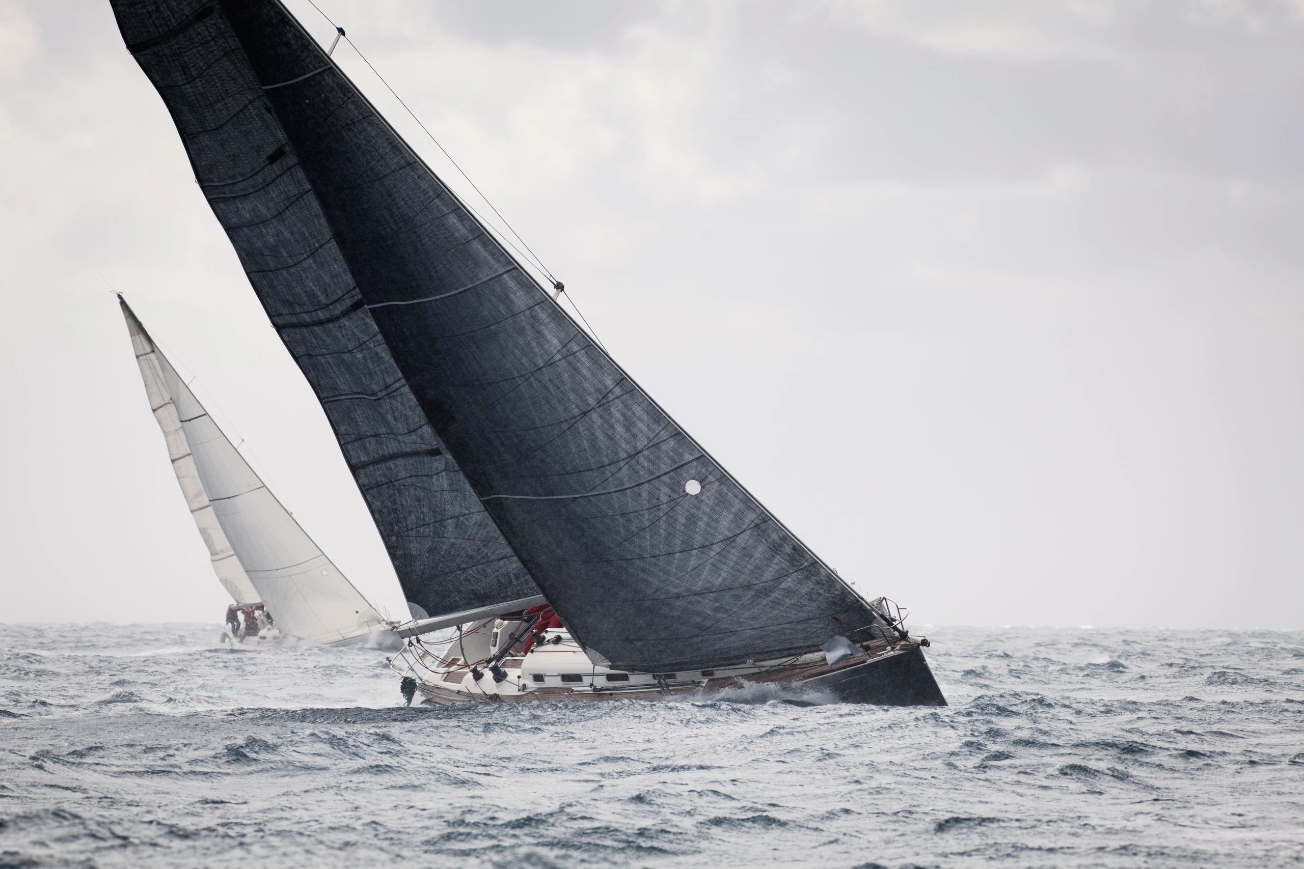 Sailing crew on a sailboat during a race